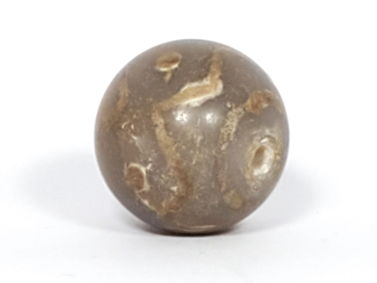 Ancient round dzi bead, grey-brown agate, wave motif, cream inclusions, visible drill hole, aged patina, polished surface