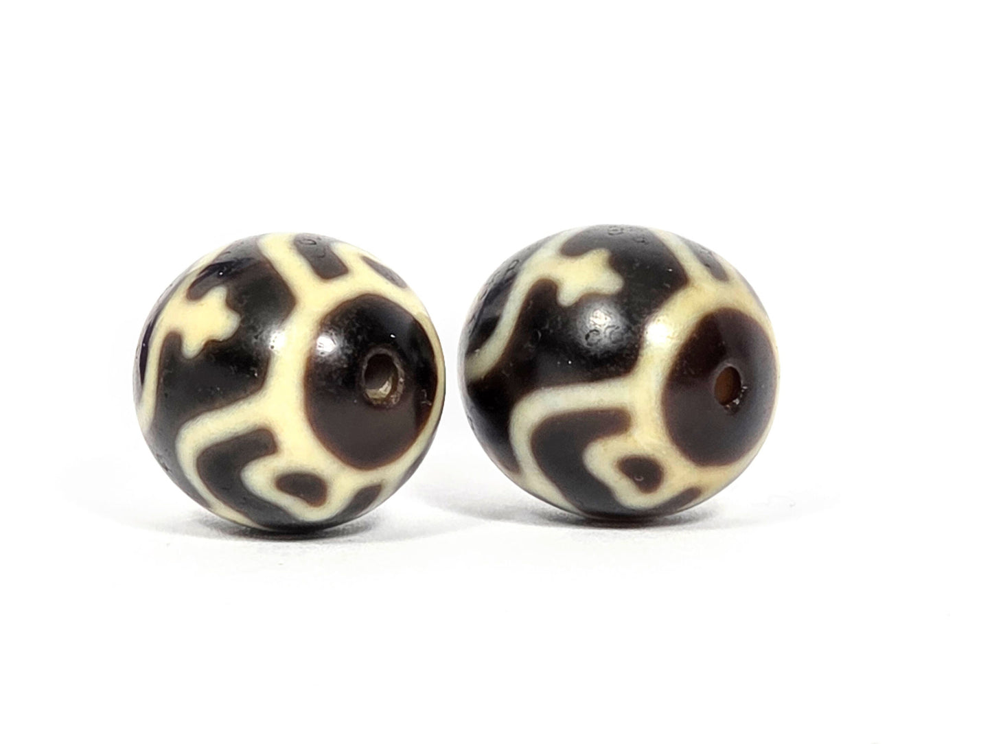V-073026-TVP2 vintage round treasure vase dzi pair drill-end view dark brown agate scrollwork unretouched