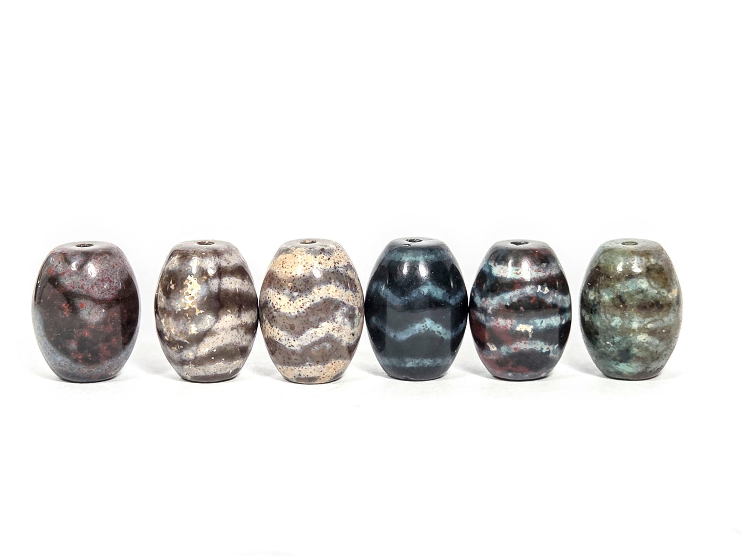 N-062626-6WDWBS clearance set six new wave dzi bloodspots, second angle, six grounds visible, unretouched