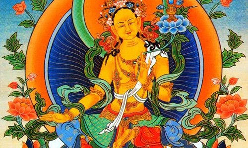 Orange Tara Pagme Nonma thangka painting — golden-orange Tibetan Buddhist goddess of abundance and non-violence, seated on lotus above river, holding golden vase of jewels, ornate floral crown
