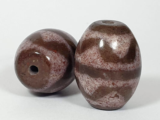 N-062926-TTBS2 pair shot second angle, Bead A spherical left, Bead B elongated right, brown agate tiger tooth pair, unretouched