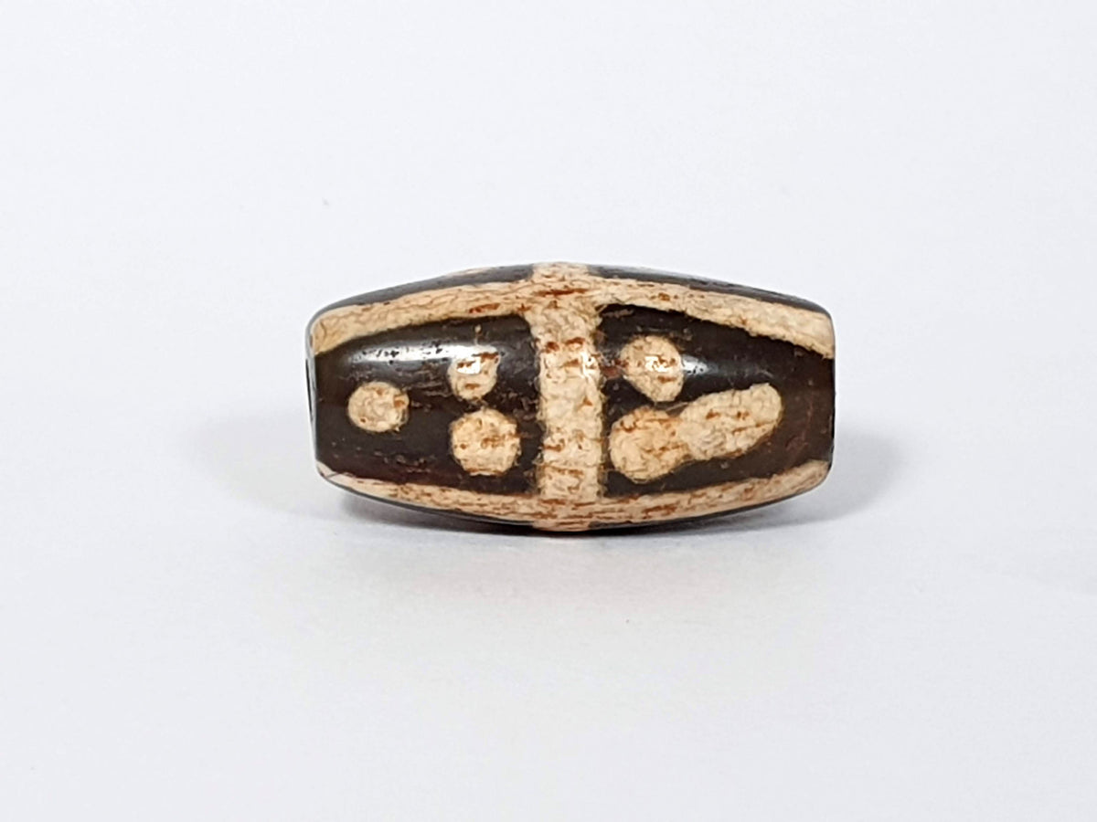 Ancient eighteen star motif agate dzi beads with dark patina and cream striping, 21mm, barrel shape