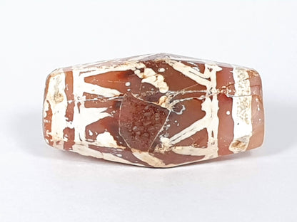 Ac-032320-LTT top face, triangular spall chip and hairline crack disclosed, terracotta-red ground, unretouched
