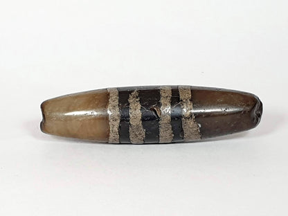 Ac-041320-7SChung ancient Chung dzi, 49.1×12.8mm, Face A, warm honey-brown ground, sandy-tan bands, unretouched