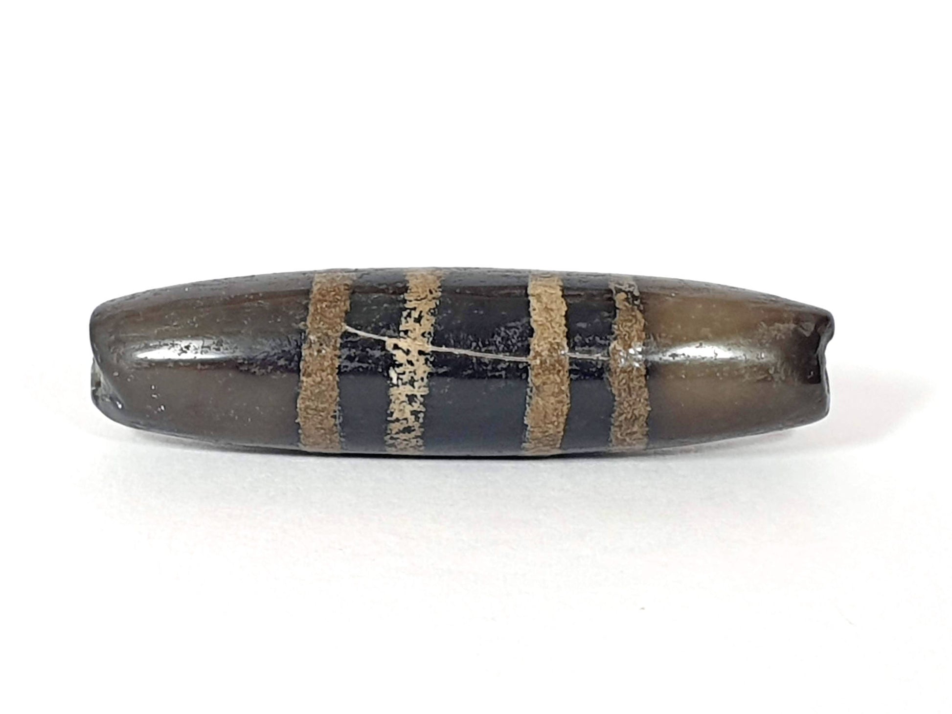 Ac-080620-7SChung ancient Chung dzi, Face D, coolest grey-brown ground tone, surface scratch visible, unretouched