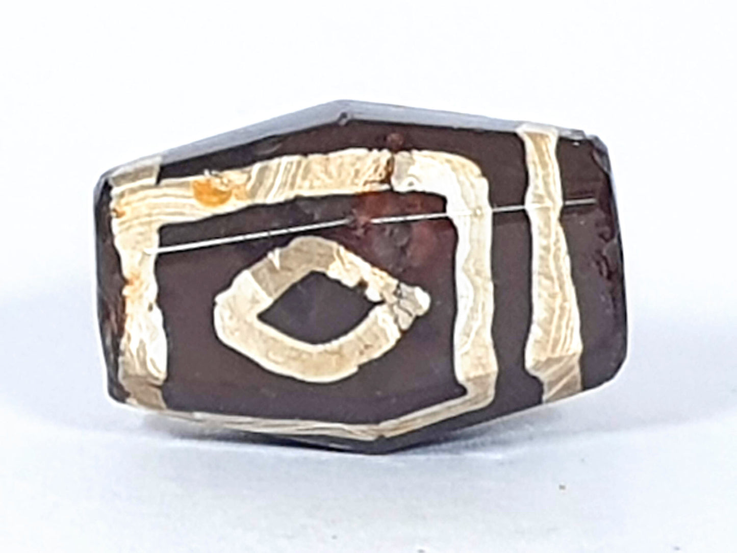 At-120120-2E7, Face C second eye, rounder oval form in rectangular cream frame, octagonal faceting, unretouched