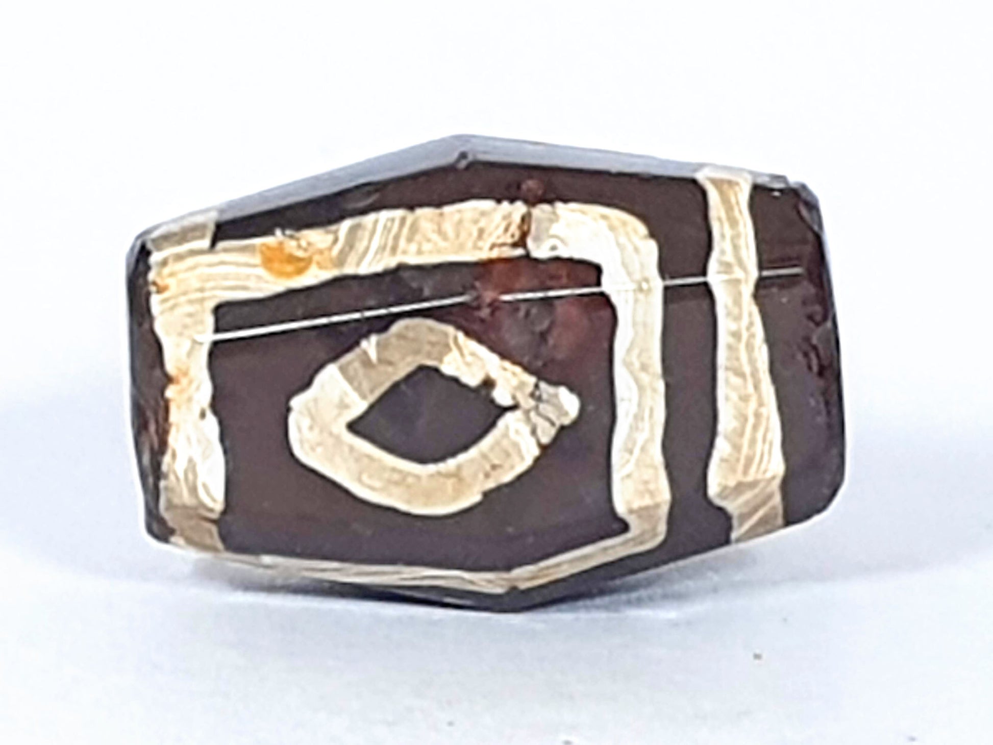 At-120120-2E7, Face C second eye, rounder oval form in rectangular cream frame, octagonal faceting, unretouched