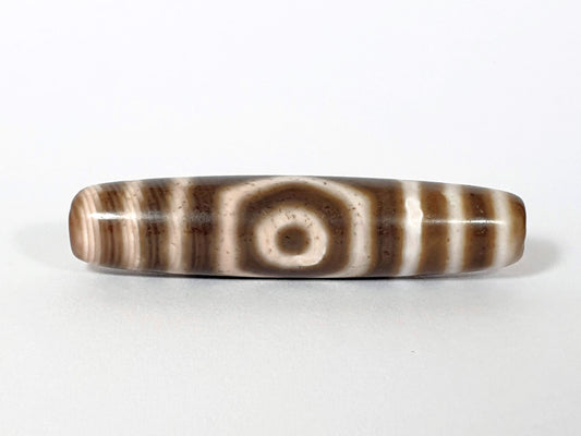 Qing Dynasty three eye dzi — front face, round eye centred, cream-brown banded agate, At-0426-3EQ