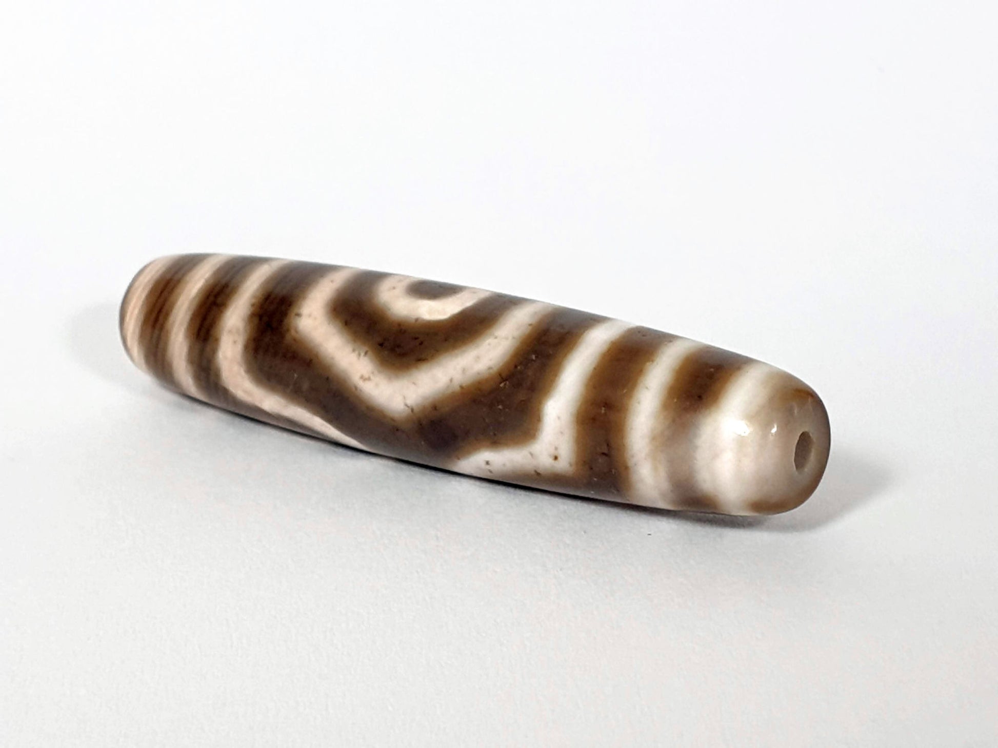 Qing Dynasty three eye dzi — opposite end, drill hole with orange-red inner ring, stripe pattern, At-0426-3EQ