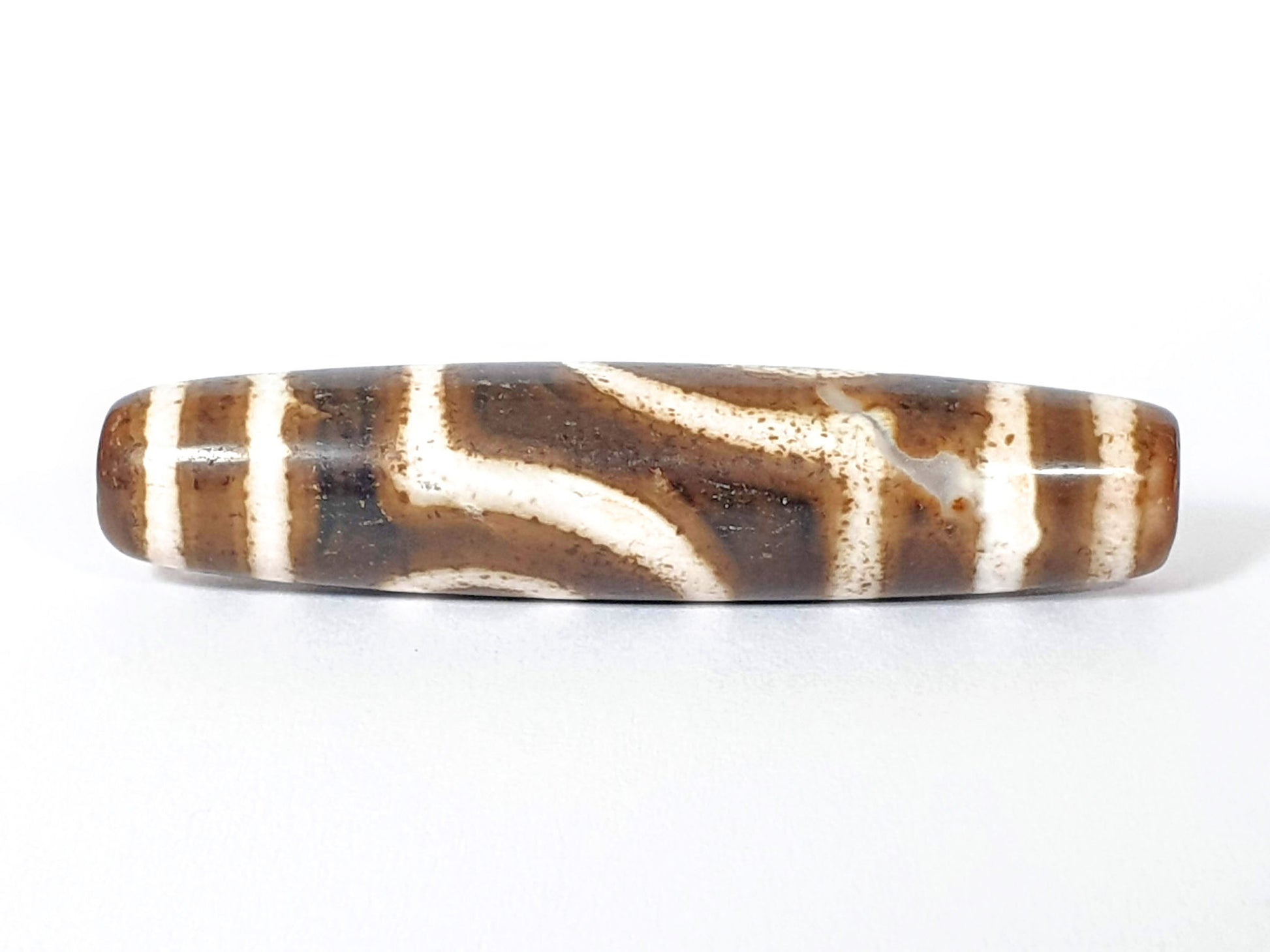 Qing Dynasty two eye dzi — reverse face, angular wave connector lines on dark brown-black ground, cream zones, At-0426-2EQ