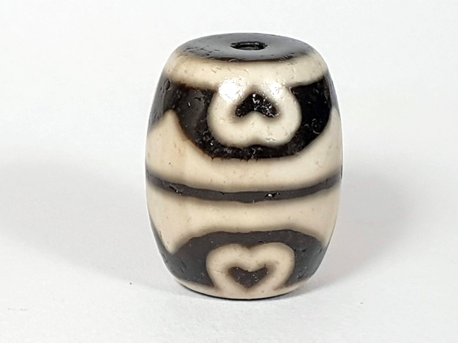 N-062226-TTSEL, upright face C, six eye lotus scroll form upper, heart tiger tooth lower, cream-ground, unretouched