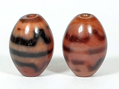 At-062926-TTBS pair second rotation, Bead A sharper bands left, Bead B diffuse bands right, terracotta agate, unretouched