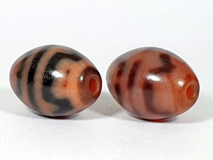 At-062926-TTBS pair drill-end angle 2, channel and tiger tooth wrap both beads, terracotta agate, unretouched