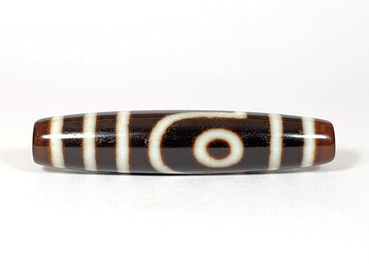 Vintage two-eye dzi bead, brown and black agate with white stripe pattern, 54.5mm, natural patina