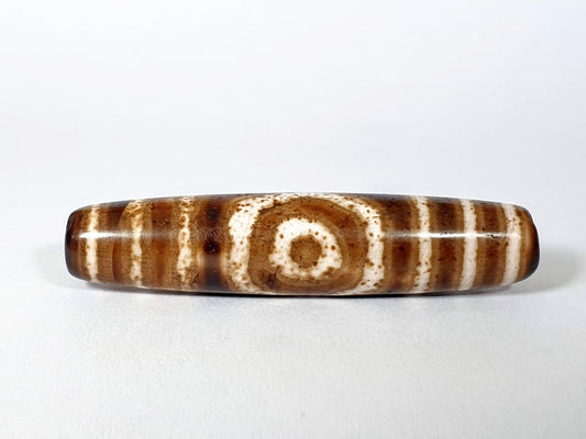 Qing Dynasty three eye dzi — front face, one large open eye centred, speckled cream zones, warm brown ground, At-0426-3EQ2