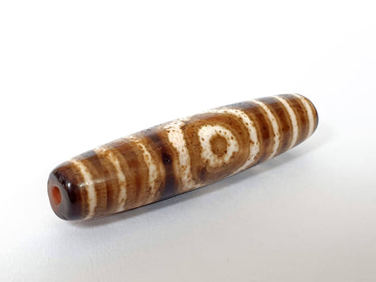Qing Dynasty three eye dzi — angled end, drill hole at narrow dark tip, speckled cream and brown stripe pattern, At-0426-3EQ2