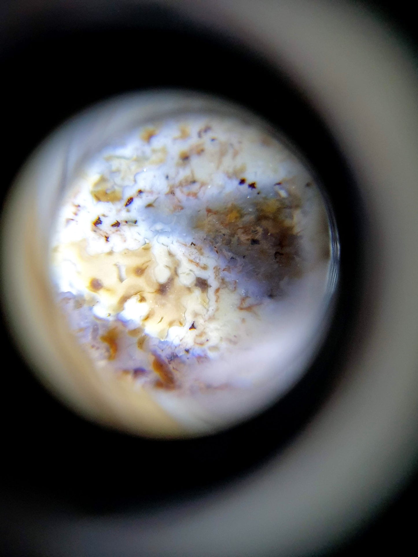 N-062426-3TSBS macro loupe photograph bloodspot cinnabar inclusions cream-zone concentrated cluster unretouched
