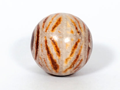 Ac-030623-DDIE carnelian dzi second angular face, two-ring diamond eye, age crack visible, unretouched