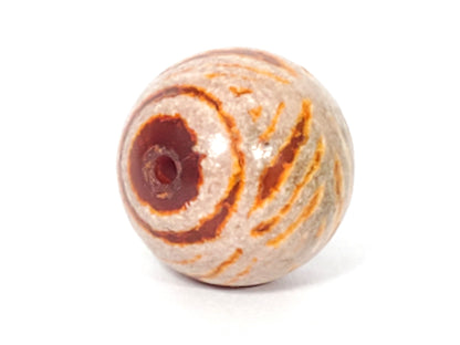 Ac-030623-DDIE carnelian dzi end view, raw terracotta-orange carnelian form, drill hole visible, unretouched