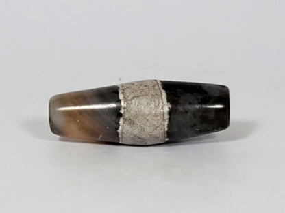 Ac-061526-1SPair, Bead B Face B, dark ground high gloss, calcification zone with mineral line, warm honey zone, unretouched