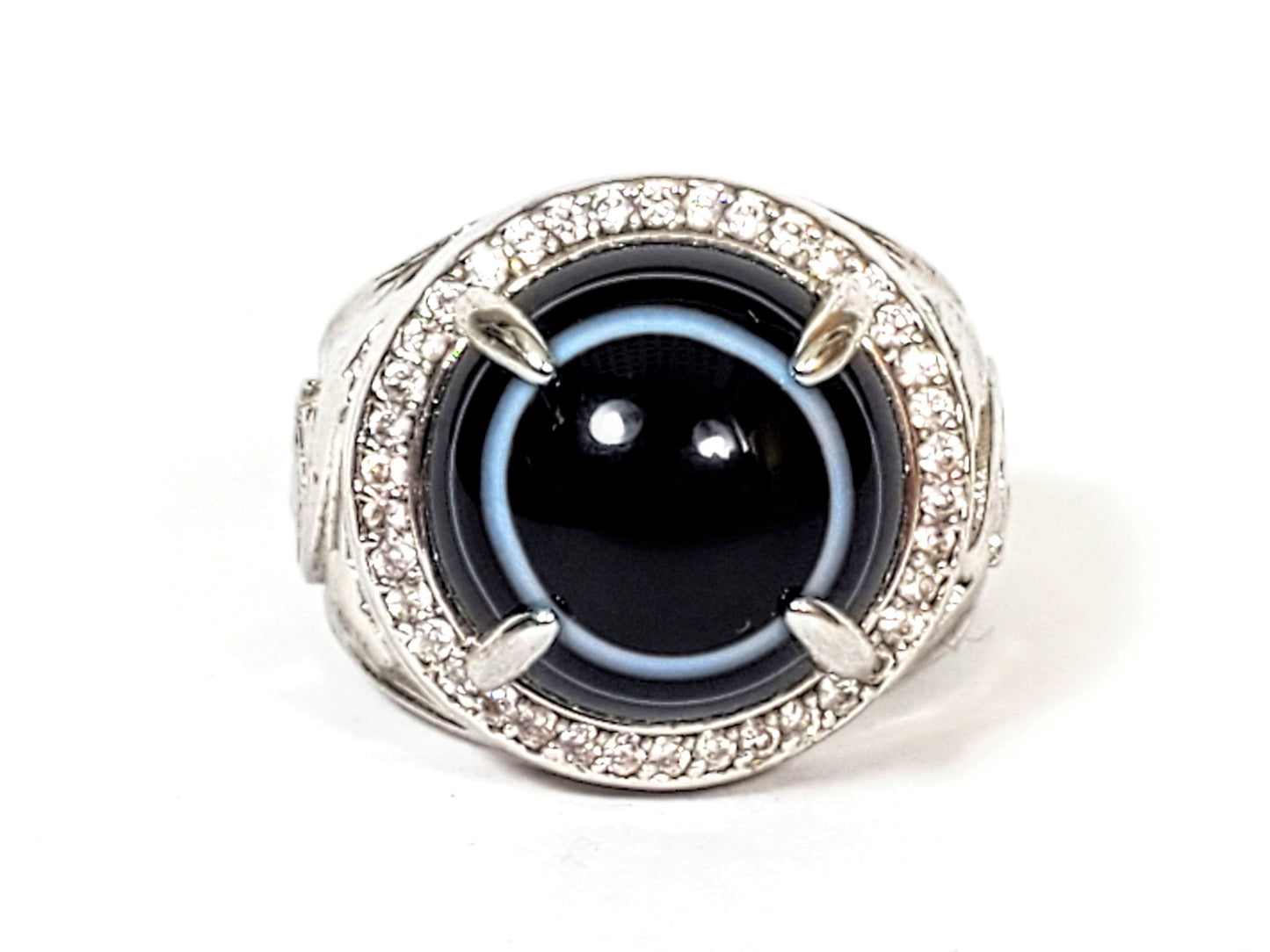R-060626-LM Luk Mik dzi ring top view, pitch-black bead, pale blue-grey band, full CZ halo, unretouched
