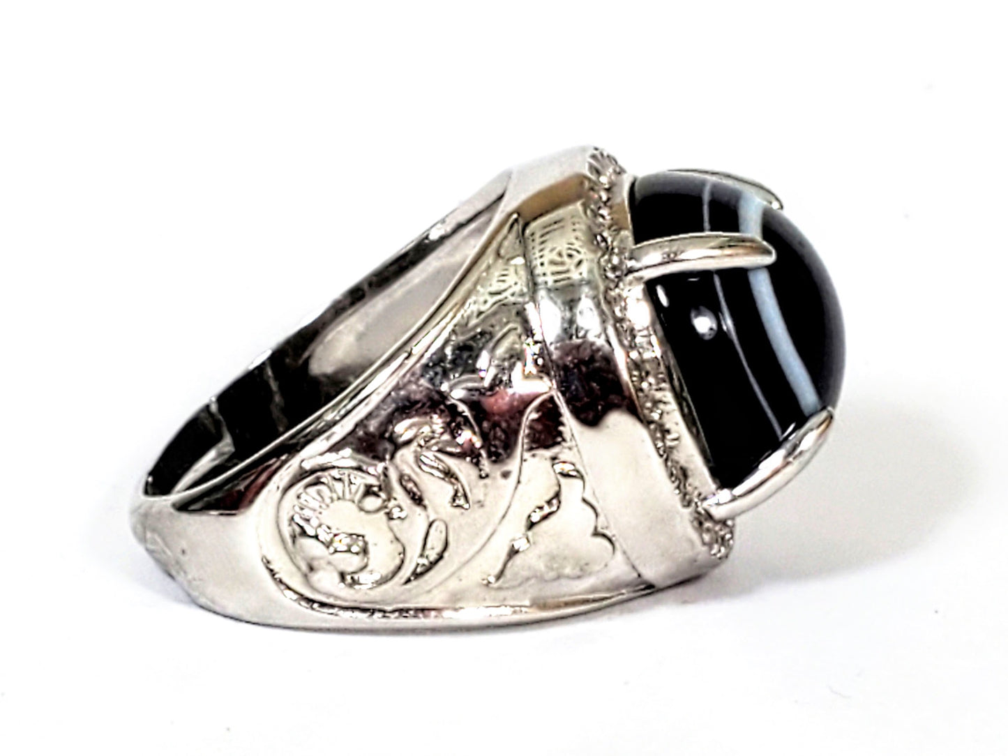  R-060626-LM Luk Mik ring left shank, bold dragon-phoenix scrollwork relief, silver-tone band, unretouche