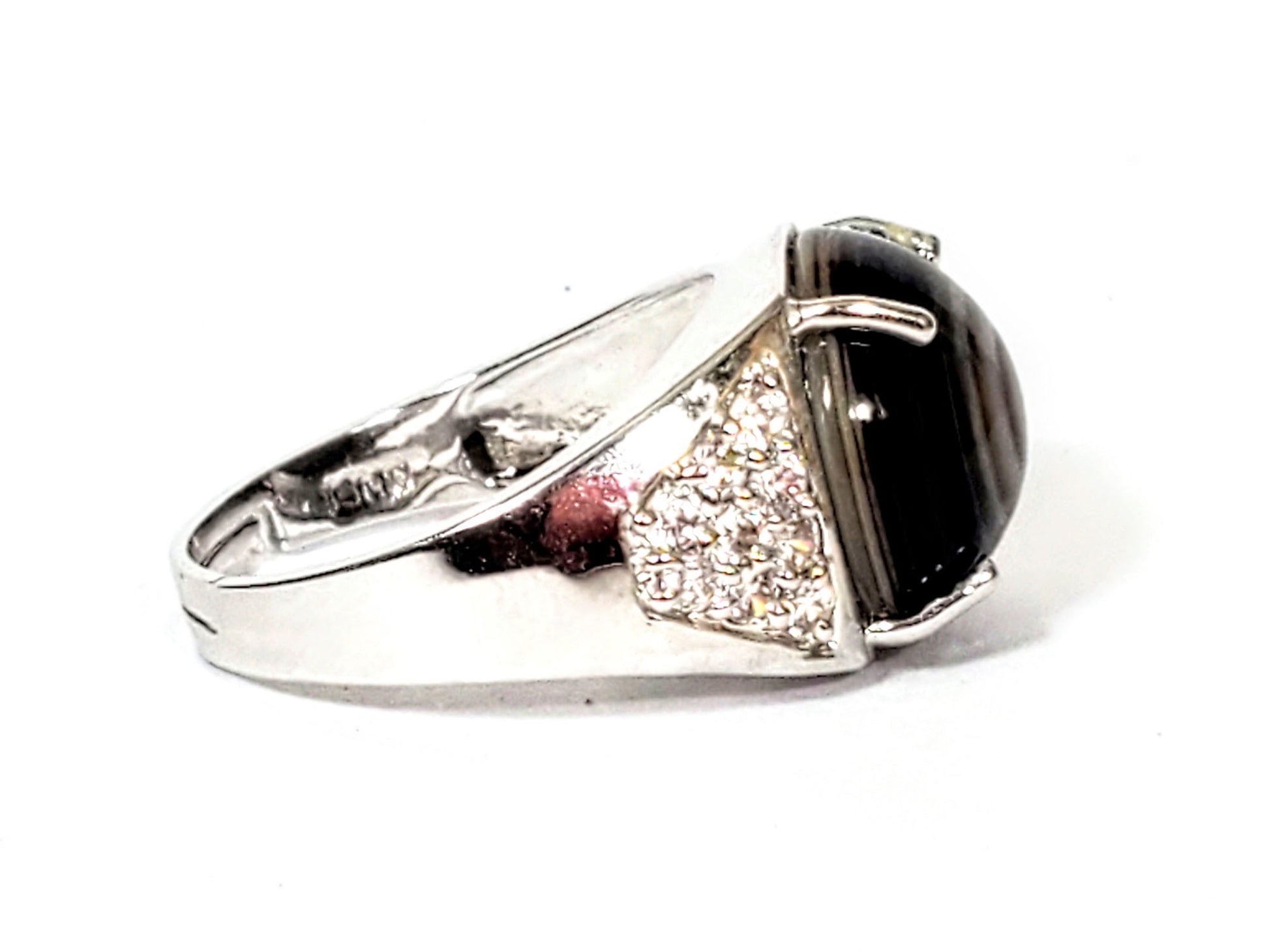 R-060626-LM2 Luk Mik ring left shank, smooth silver-tone, triangular CZ panel, grey-brown bead visible, unretouched
