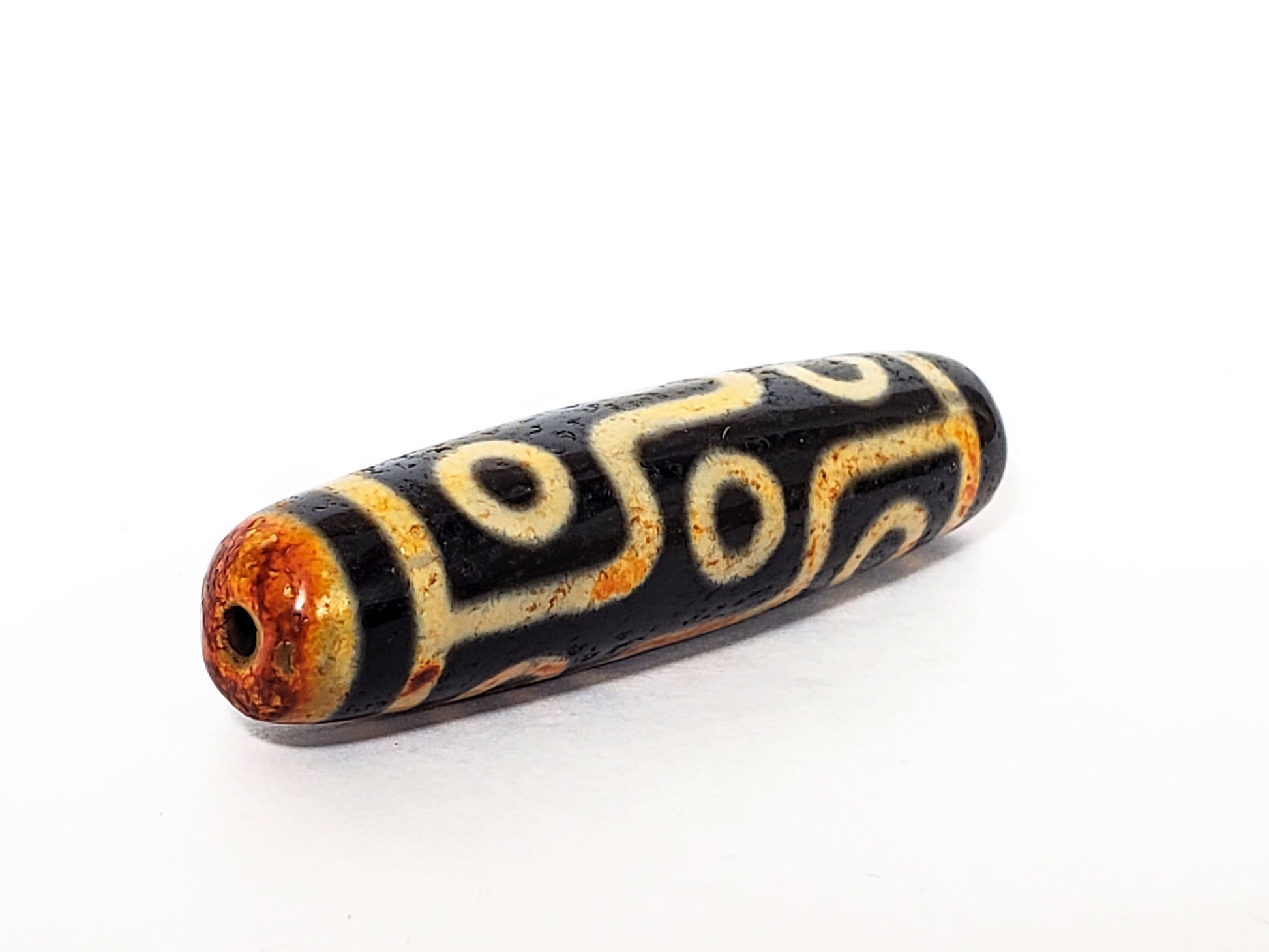  V-FA-062026-9EA1 angled view, rust-orange end cap, clean drill opening