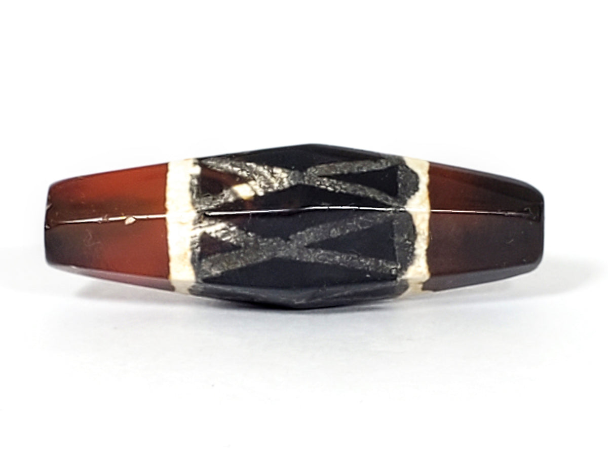 Ancient carnelian dzi bead hexagon shape criss-cross motif black white etched agate patina drilled collectible Tibetan