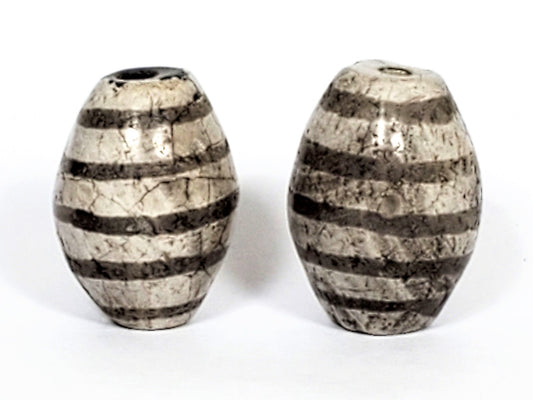 Ac-062626-9SChung2 pair ancient nine stripe Chung dzi, cream-white ground, 19.8×14.7 & 20.6×15.1mm, unretouched