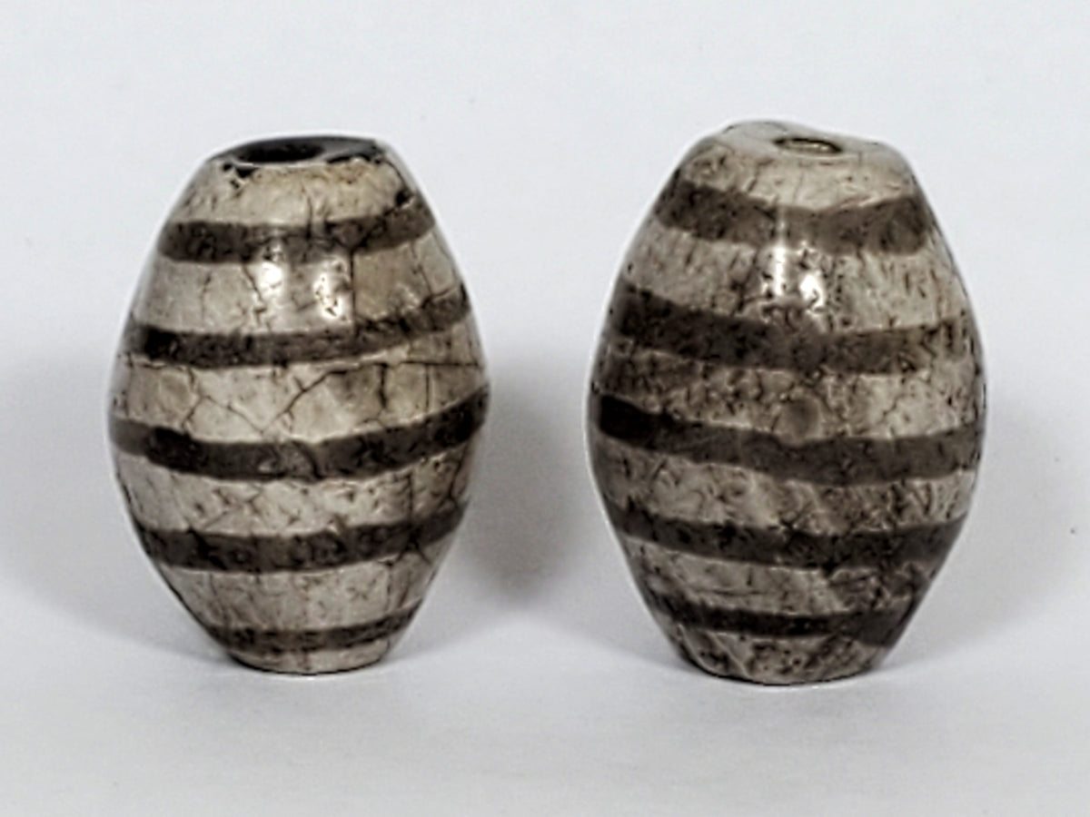 Ac-062626-9SChung2 pair ancient nine stripe Chung dzi, cream-white ground, 19.8×14.7 & 20.6×15.1mm, unretouched
