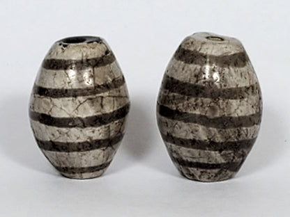 Ac-062626-9SChung2 pair ancient nine stripe Chung dzi, cream-white ground, 19.8×14.7 & 20.6×15.1mm, unretouched