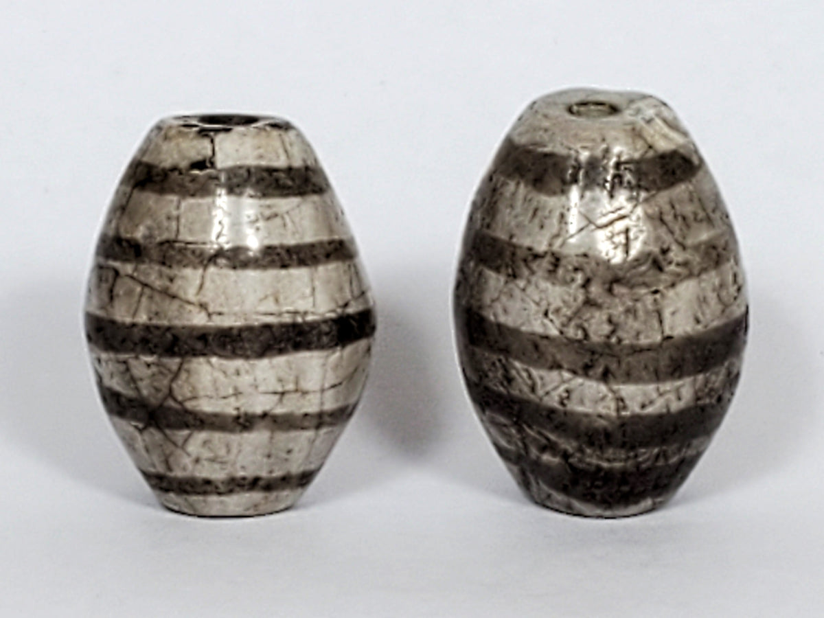 Ac-062626-9SChung2 pair ancient Chung dzi, second face view, surface crazing visible, cream-white agate, unretouched