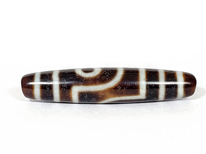 V-070226-2E dzi bead, rotation view showing stepped connecting line, dark brown, unretouched photo.