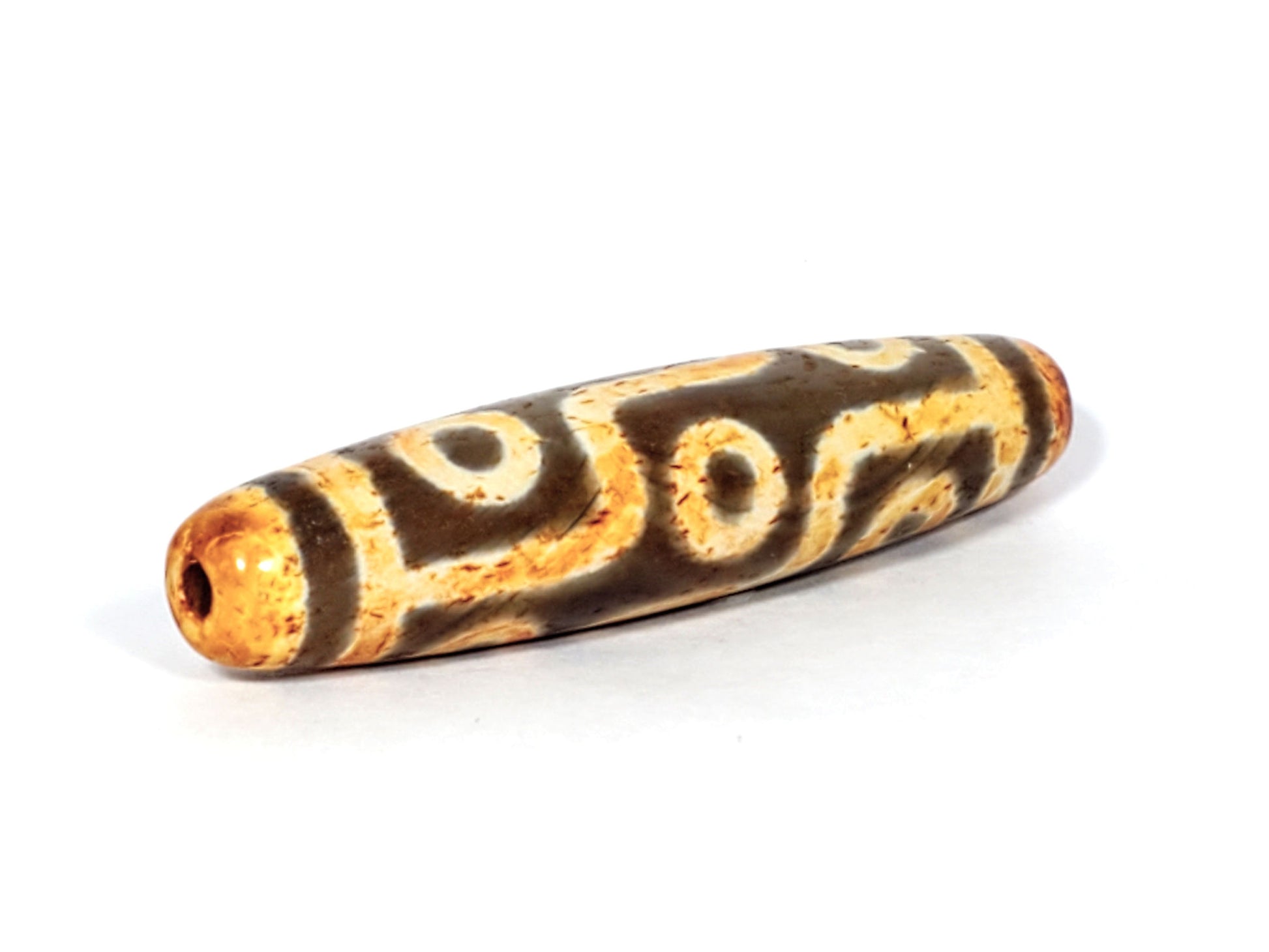 V-FA-062026-9EA3 angled view, amber-gold end cap, clean drill opening