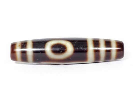 V-070226-OEM vintage one eye mountain dzi bead, front view, dark brown ground, cream eye motif, 48.6×11.3mm, unretouched.