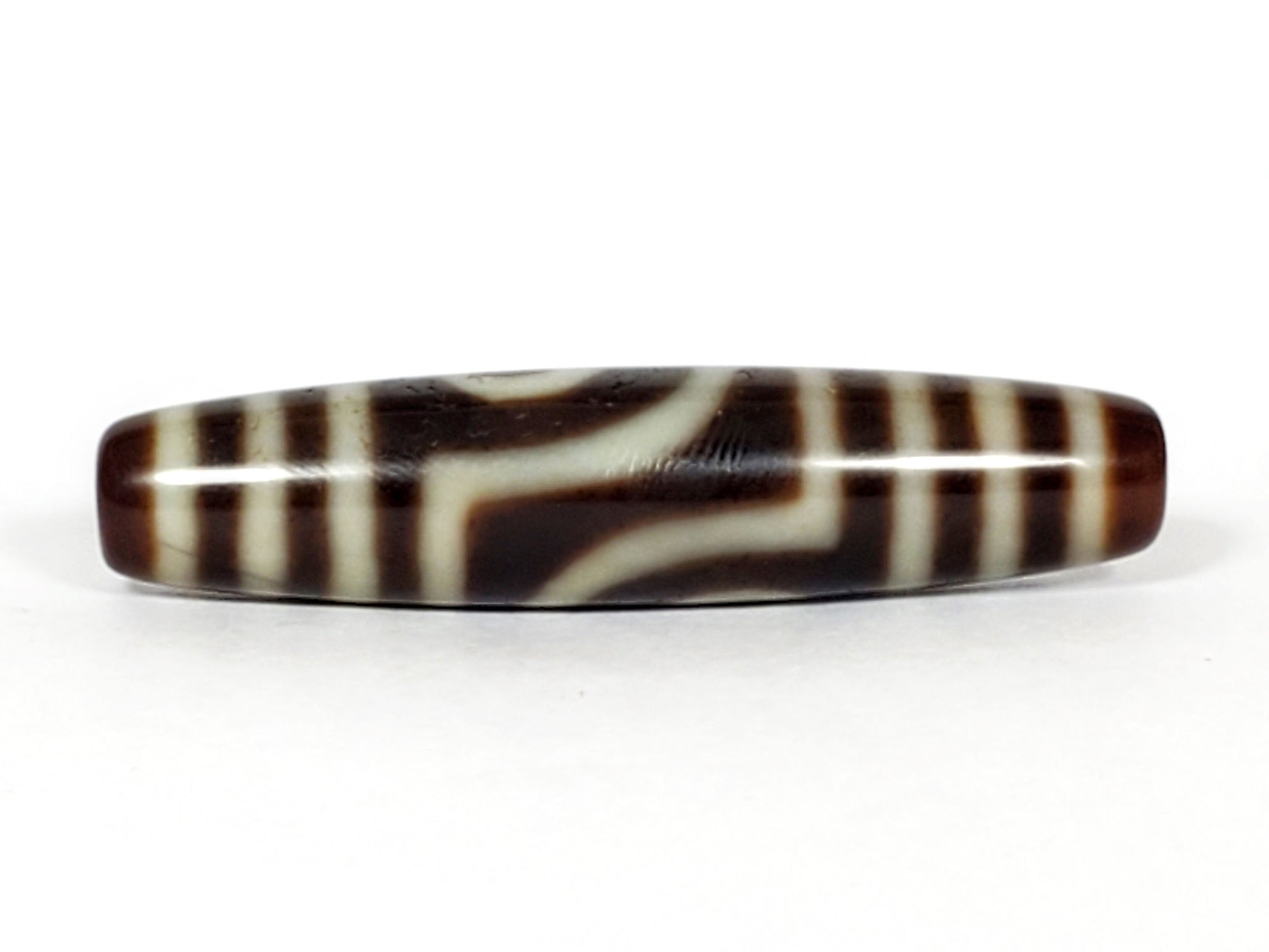 V-031122-2E dzi bead, single eye face with triple-bar stripes, brown agate, unretouched.