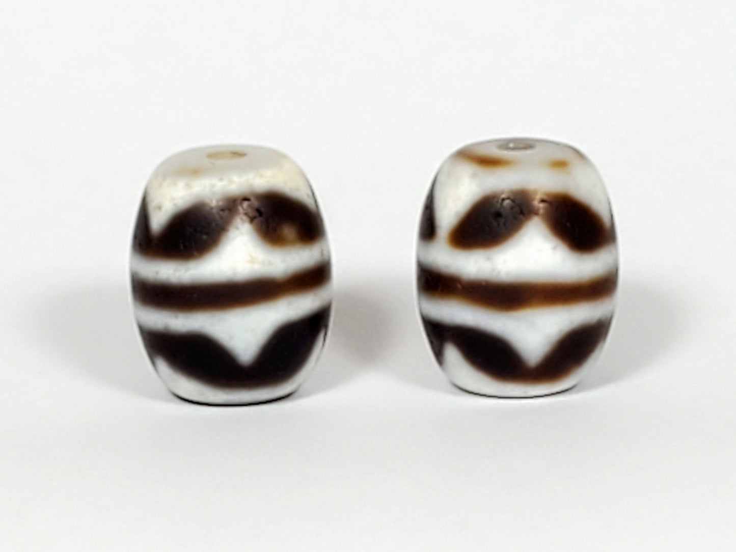 V-041122-DTT pair vintage double tiger tooth dzi, second face, chocolate-brown chevron motif both beads, unretouched