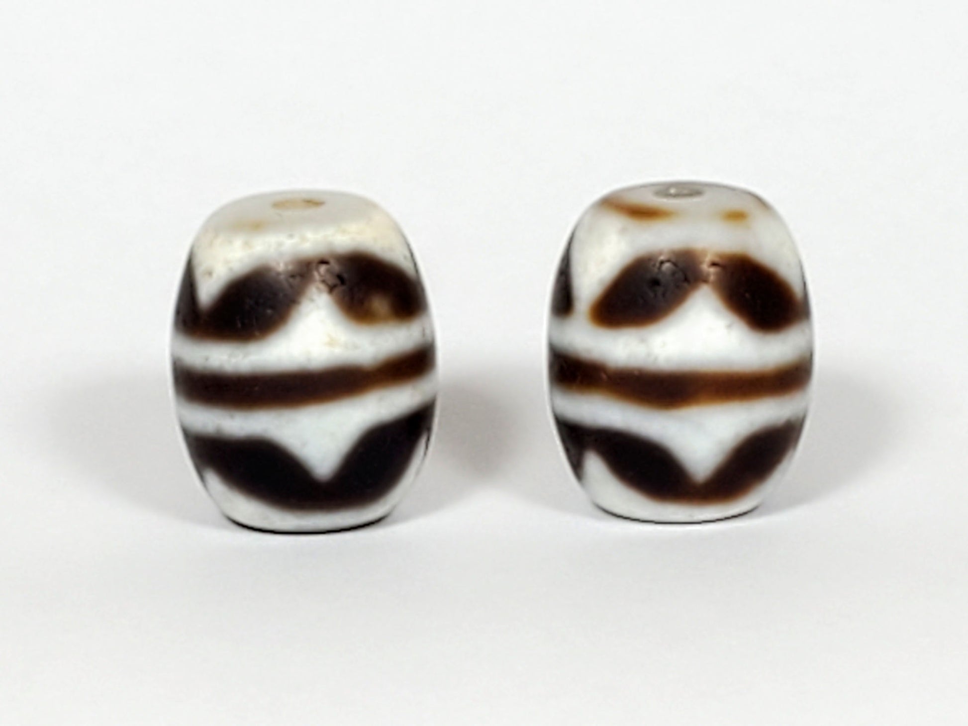V-041122-DTT pair vintage double tiger tooth dzi, second face, chocolate-brown chevron motif both beads, unretouched