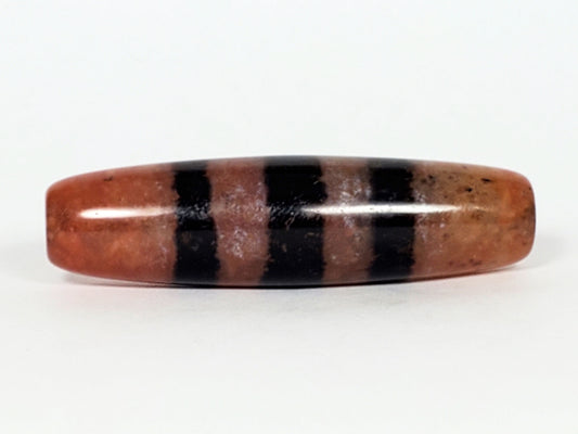 At-070622-5SChung, 48.2×13.1mm five stripe Chung dzi, terracotta reddish-brown ground, wide pitch-black stripes, unretouched