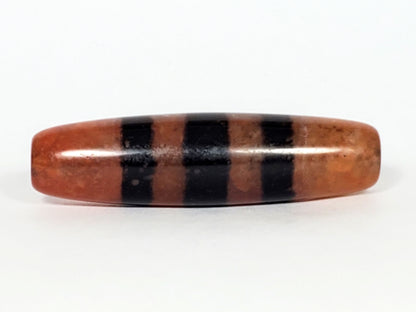 At-070622-5SChung, Face B, lower profile, wide black stripes over terracotta reddish-brown, semi-gloss surface, unretouched