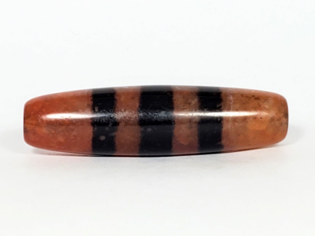 At-070622-5SChung, Face B, lower profile, wide black stripes over terracotta reddish-brown, semi-gloss surface, unretouched
