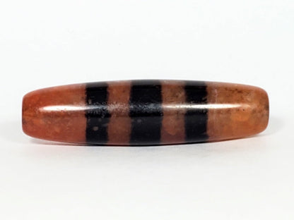 At-070622-5SChung, Face B, lower profile, wide black stripes over terracotta reddish-brown, semi-gloss surface, unretouched