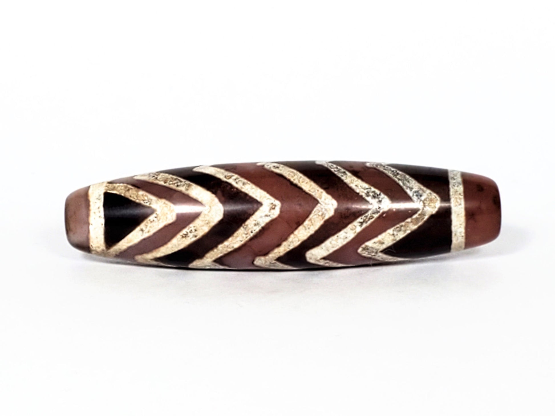 At-070822-6TS face A hero, 50.7×12.9mm chocolate-brown carnelian, 6 tiger stripe chevrons, dark end cap left, unretouched
