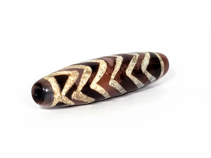 At-070822-6TS face D, six parallel chevrons, deep chocolate-brown carnelian, aged sandy-cream lines, unretouched