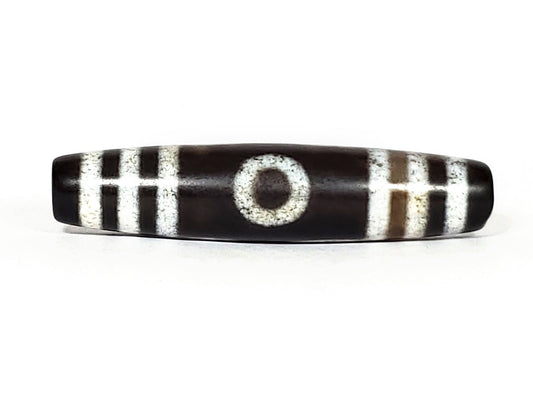 N-062426-3E new three eye dzi 58.6x13.4mm Face A single central eye dark to near-black ground cream motif unretouched