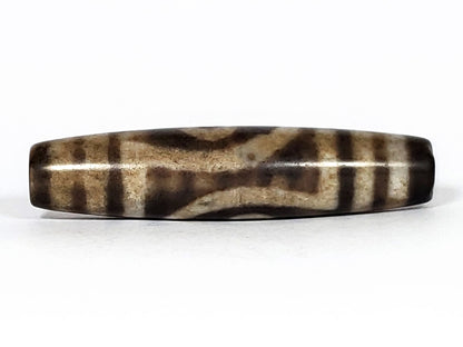 N-062126-2E2 dzi bead, opposite side profile, second eye face, unretouched