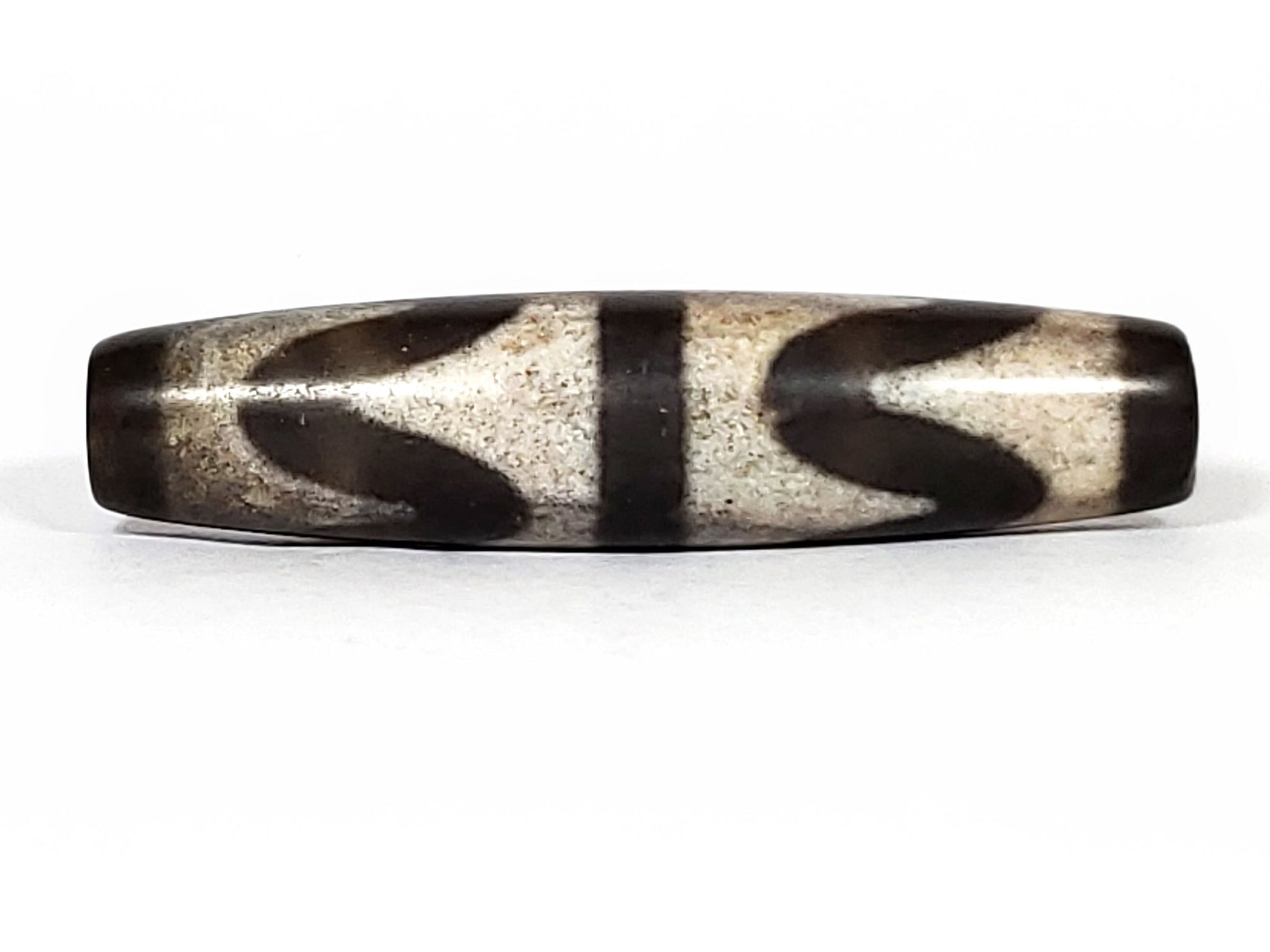 N-062226-DW2, double wave agate dzi, 58.2×13.8mm, very dark brown, sandy-beige wave motif, face A, unretouched