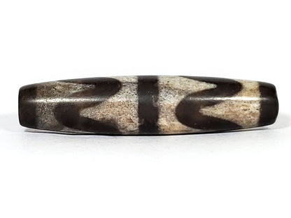 N-062226-DW2, face A close, open wave arc sandy-beige field on very dark brown ground, central bar, unretouched