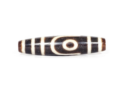 V-070426-2E3 vintage two eye dzi bead, front view, brown to black ground, 52.7×12.2mm, unretouched.